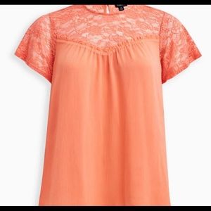 Torrid size 1 coral flowy top/ Never worn but no tag’s.  Cover pic from Torrid.